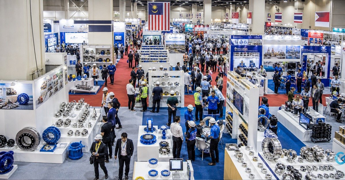 OGA Kuala Lumpur trade show floor with pipe fitting and coupling exhibitor booths and ASEAN industry visitors